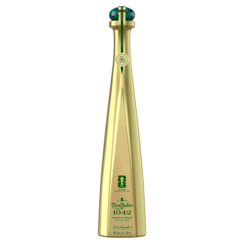 Gold tequila bottle with green cap on a white background